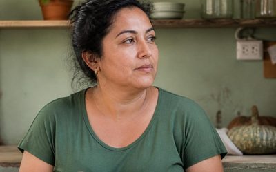 Woman with natural, healthy skin in soft light