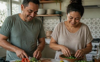 Couple preparing a healthy meal together in a bright kitchen